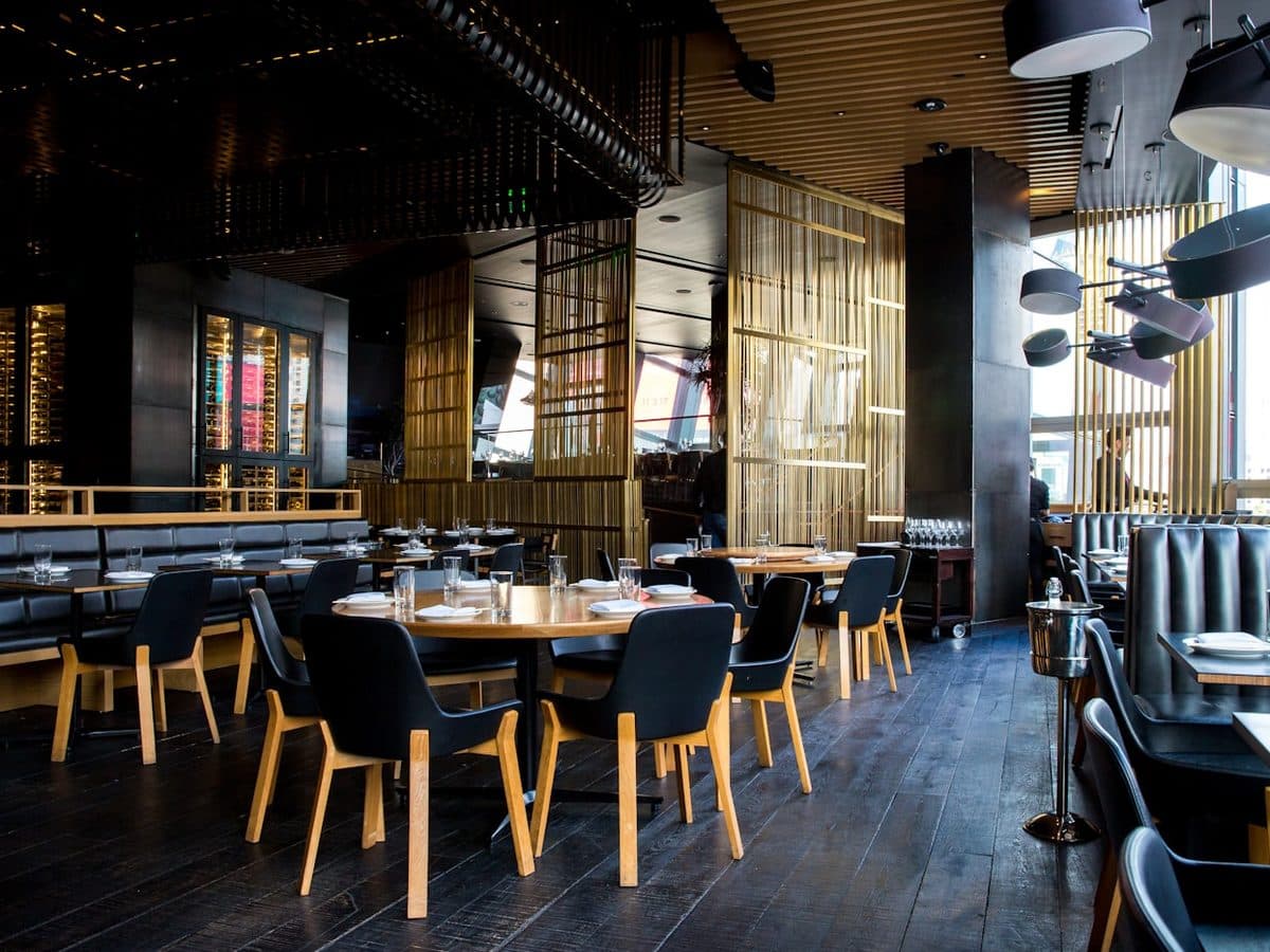 A large restaurant floor laid up before service